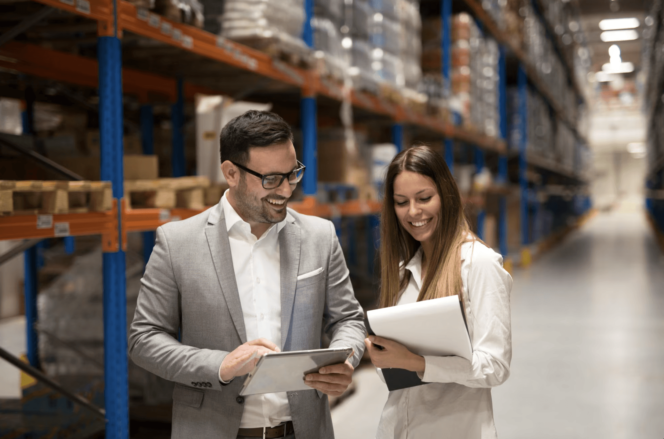person writing on a piece of paper 